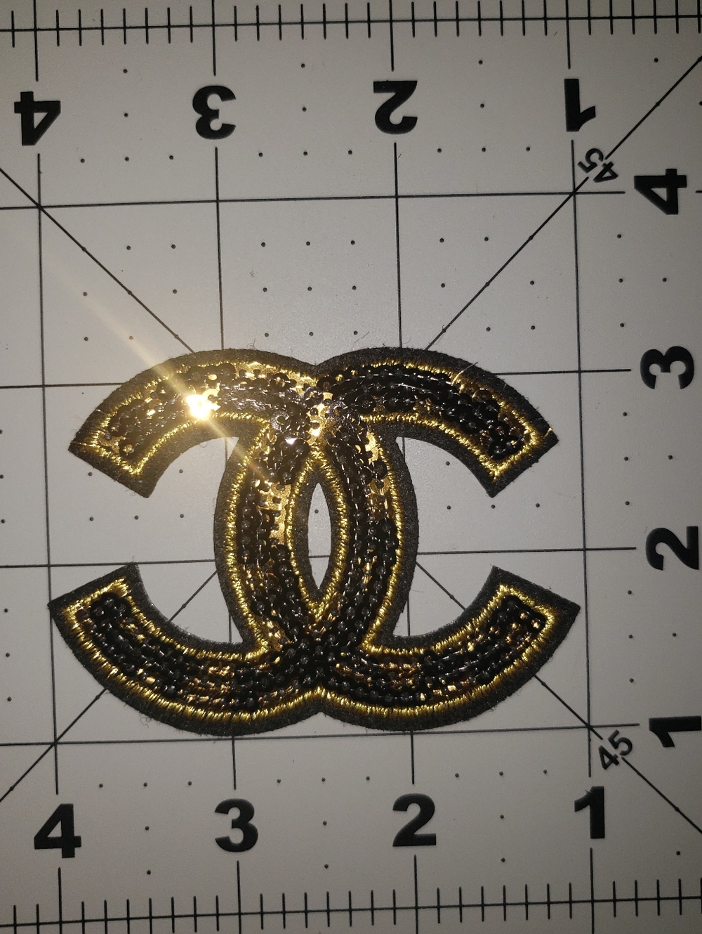 Gold and Black Chanel Interlocking Logo Appliqué Patch -